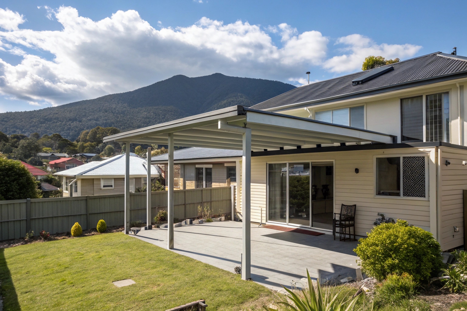 Insulated patio enclosure on Hobart home with mountain views
